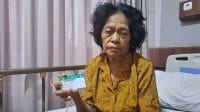 saki Isterina (75) merupakan salah satu peserta program BPJS Kesehatan